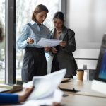 10 Ways to Invest Wisely Without Constant Monitoring people-office-analyzing-checking-finance-graphs-2048x1367